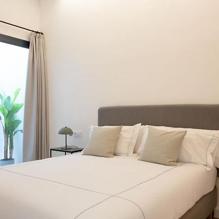 Santa Ana 18 Suite Apartments Sevilla Bagian luar foto